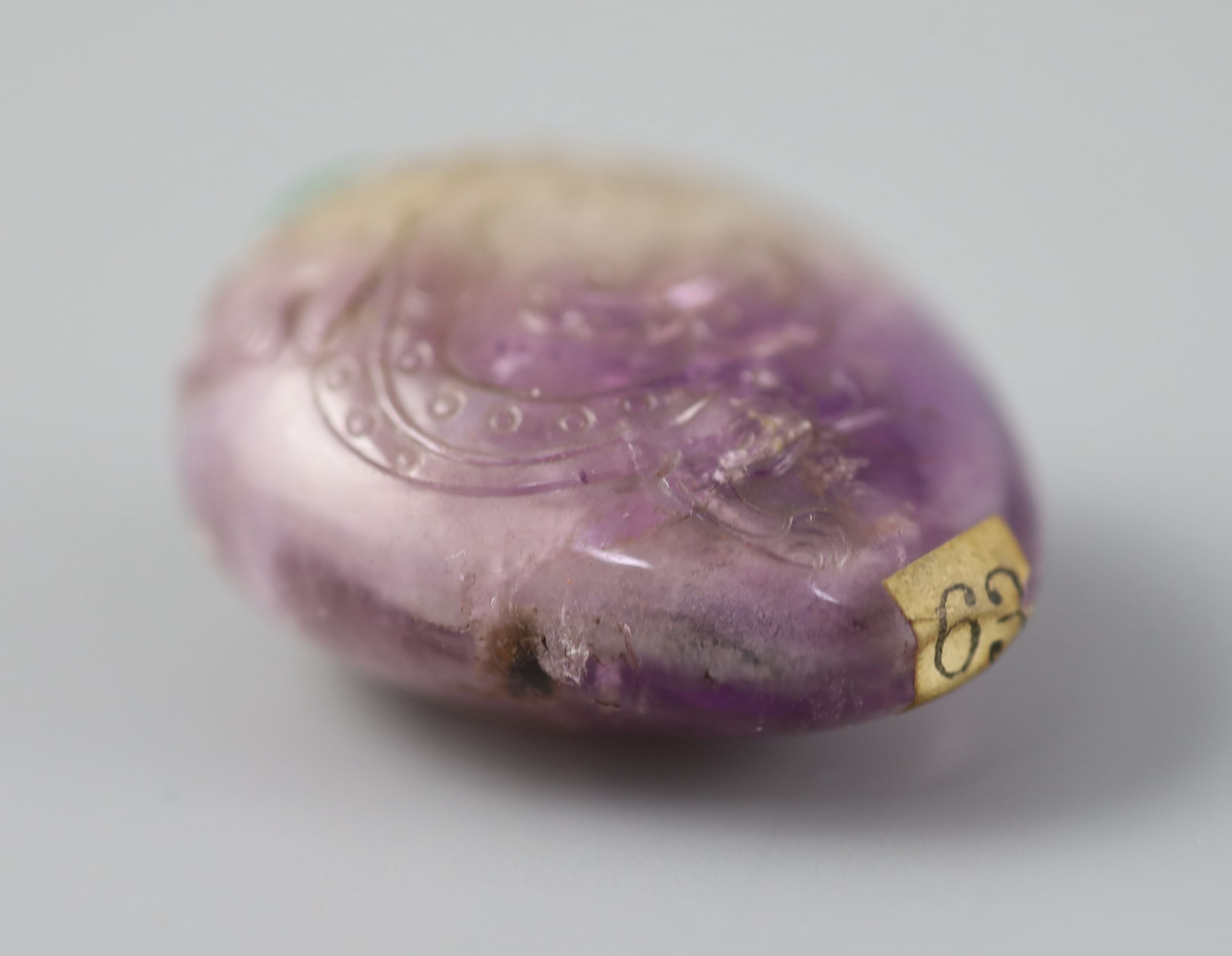 A Chinese amethyst crystal snuff bottle, 1800-1900, total height 5.1cm high